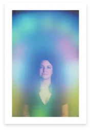 Aura photograph with green and teal hues