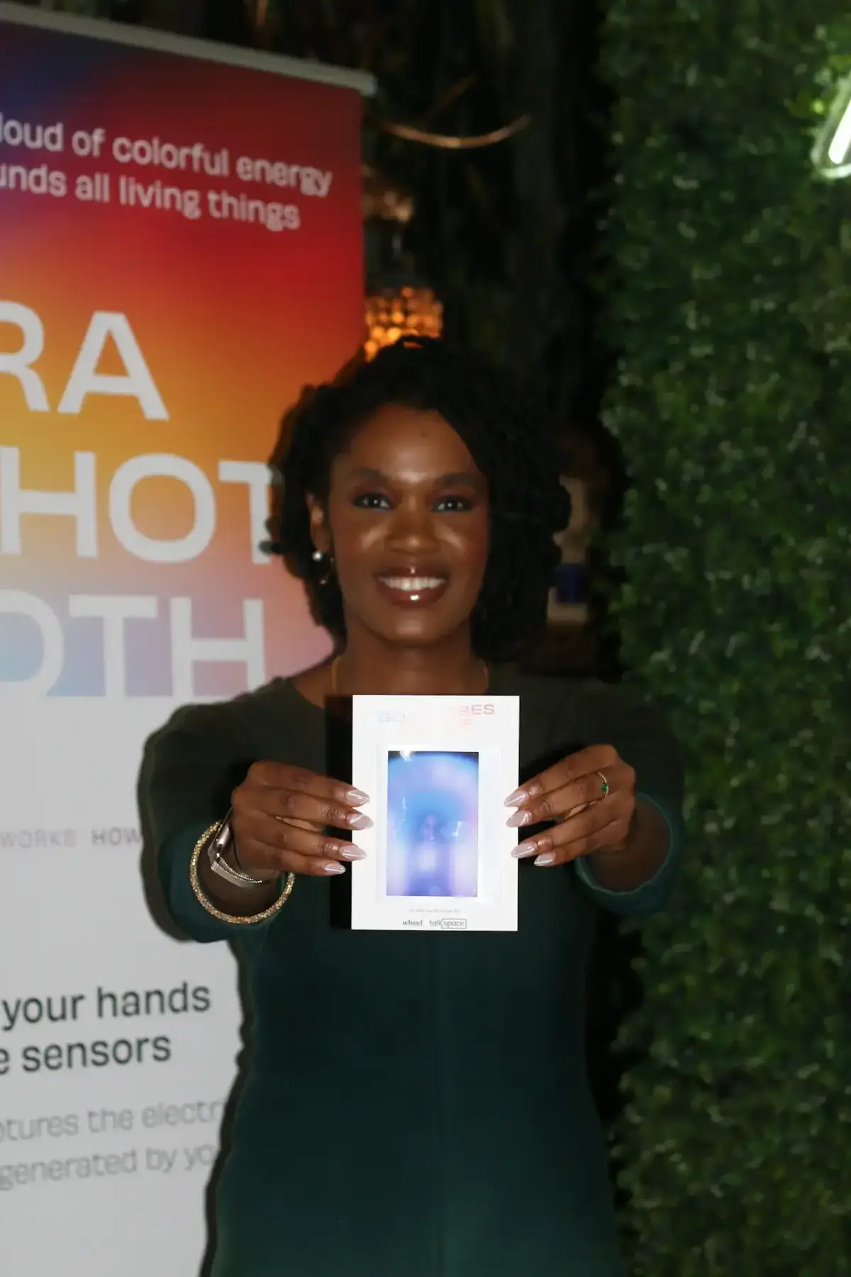 Team members experiencing corporate event aura photography at an Arizona resort