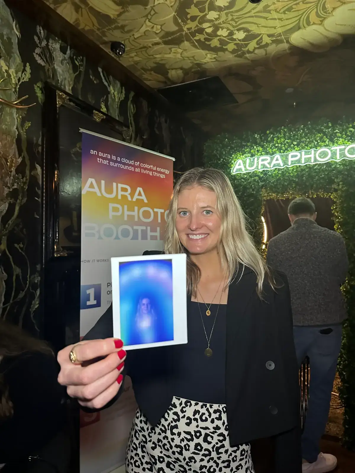 Guests experiencing corporate event aura photography at a Las Vegas resort reception